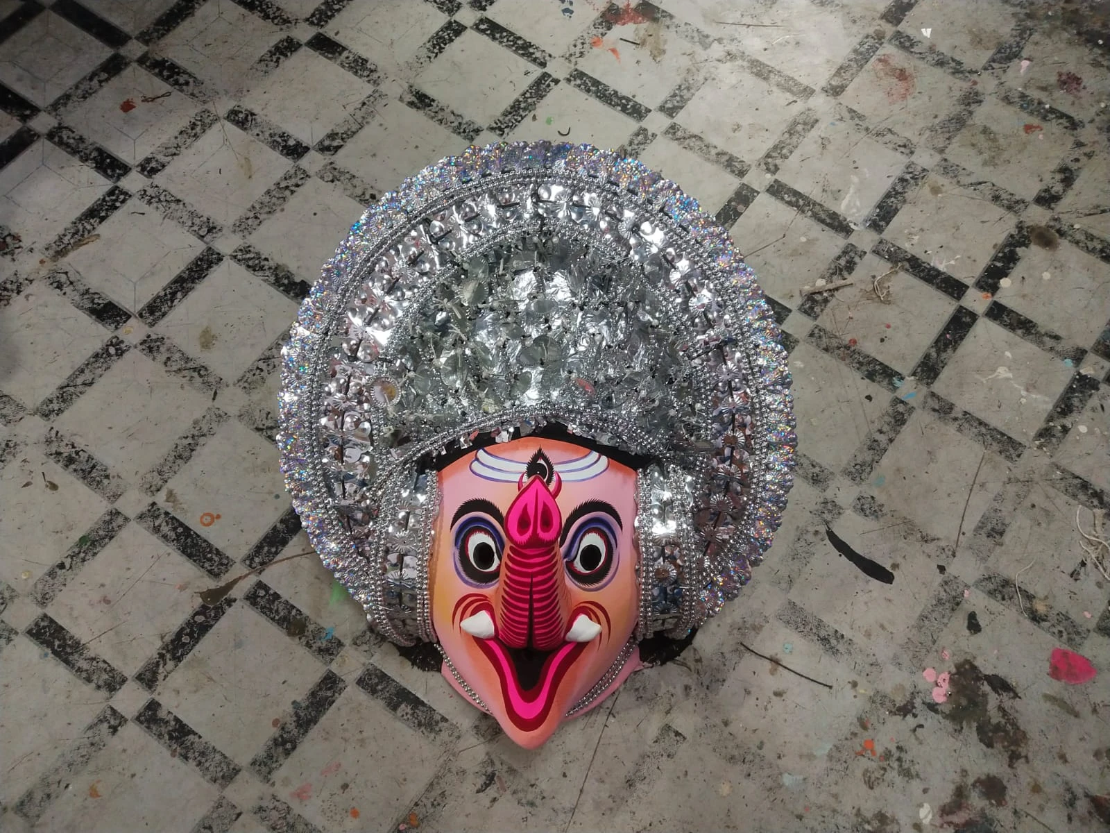 Chhau mask being hand-carved
