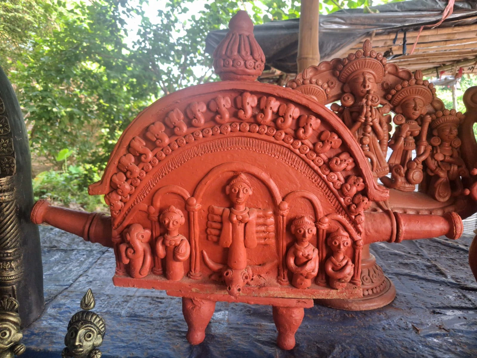 Hand-painted terracotta mugs with Bengal folk-art motifs